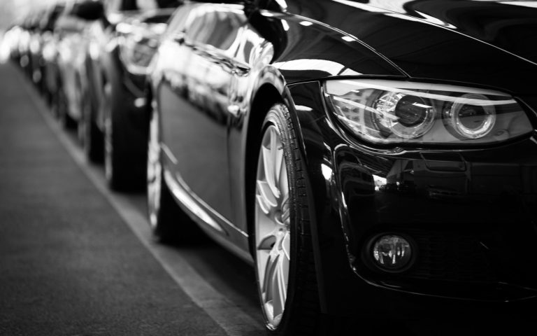 What are the main components of a car’s suspension system?
